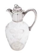 A late Victorian silver mounted clear-glass claret jug,