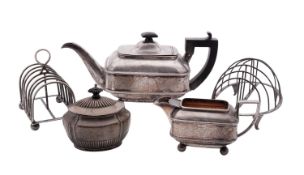 A late Victorian silver tea caddy, shaped oval form, with a part-fluted body & cover,