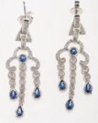 A pair of diamond and sapphire chandelier drop earrings, of Art Deco style,