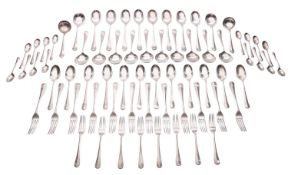 An early 20th century part-canteen of Hanoverian pattern silver flatware; comprising 12 soup spoons,