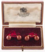 A pair of cufflinks,