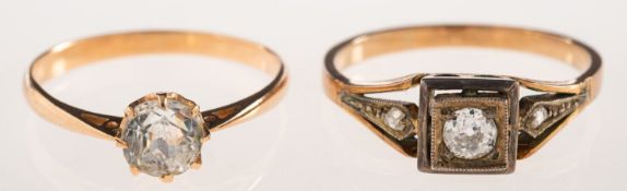 An Art Deco diamond ring and a paste set solitaire ring,