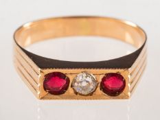 An Art Deco three stone ring, of rectangular geometric form,