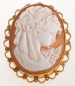 A 9ct gold cameo brooch, a carved oval cameo depicting a maiden with ringlets,