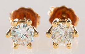 A pair of diamond stud earrings, each claw set with a brilliant-cut diamond, diamonds approx. 0.
