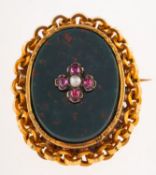 An antique French bloodstone, ruby and pearl brooch, (possibly late Victorian/early 20th century),