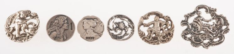 A mixed collection of Art Nouveau silver buttons, including six buttons depicting a maiden,