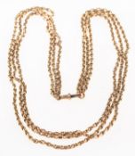 A graduated three strand curb chain necklace,