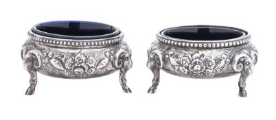 A pair of Victorian silver salts, squat circular form, with bead borders,