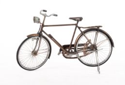 A metal working model of a bicycle.