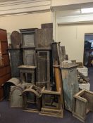 Seven various longcase clock cases, hoods and hood doors, dating from the mid-18th century.