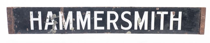 A 20th Century double sided railway station enamel sign 'Charing Cross/Hammersmith'.