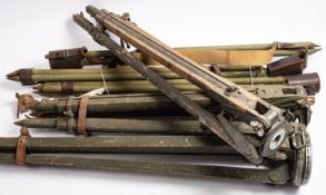 Six wooden telescope tripods. Having metal plates and some with canvas straps etc.