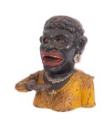 An early 20th Century English cast iron money bank 'Dinah'.