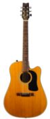 A Washburn electro acoustic D-12CE/N guitar, serial number 8904087,