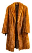 Two lady's faux fur coats,