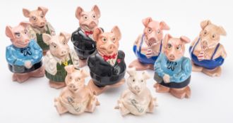 Ten Wade Natwest 'Piggy Bank' models, various designs with stoppers to base, largest 19cm high.
