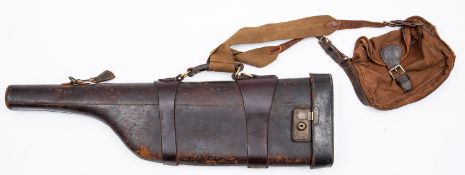 A brown leather Leg O'Mutton gun case. 30.5' long, together with a canvas cartridge bag.