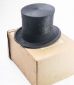 An Austin Reed Ltd black beaver felt top hat.