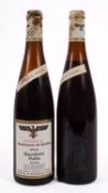 Two bottles of Raunthaler 1976 Auslese. One low in fill level, no vols shown.