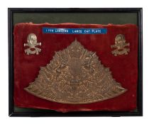 A Reproduction 17th Lancers cap plate.
