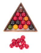 A collection of composition snooker balls.