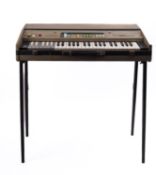 A Farfisa 'Compact Minor' electric organ , circa 1960s, with white and grey two-tone keyboards,