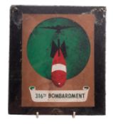 A painted metal 316th Bombardment plaque.