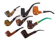 A collection of eight pipes.