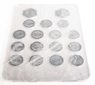 A set of Mercedes Formula One World Champions' medals.