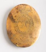 A 19th Century West Gray Fusiliers brass plate. Of oval form with armorial to the centre. 9cm high.