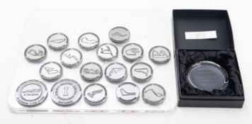 A composite set of 2015 Mercedes Formula One Champions' medals.