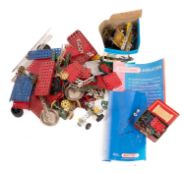 A mixed collection of Meccano. Including base boards, wheels and axles etc.