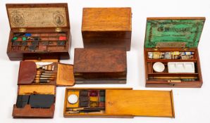 A collection of artists supplies in three boxes.