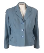 A light blue 1960's 'Seigal' lady's jacket with bow faux pocket details,