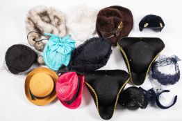 A group of various hats, including fur hats, skull caps, pill box hats, fascinators,