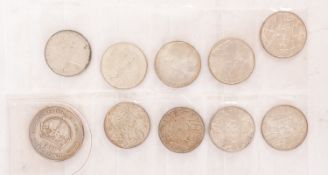 Nine 1966 Australian 50c coins with a 1937 Australian Crown.