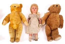 Two mid 20th Century teddy bears, together with four dolls.