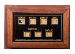 An early 20th Century oak cased servant's bell box.