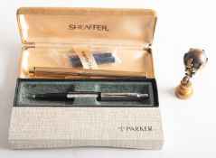 A Sheaffer gold plated fountain pen with 14ct nib.