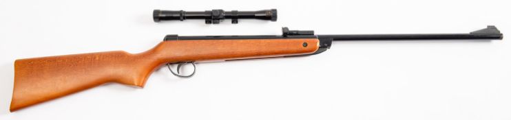 A BSA Meteor break barrel air rifle and scope. Serial number TS75132, having a 18.