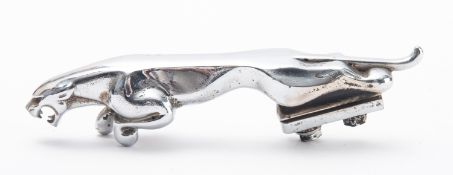 A 20th Century chrome plated leaping Jaguar bonnet mascot. With washers and bolts, 19cm long.