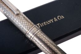 A Tiffany & Co silver fountain pen. The pen marked .