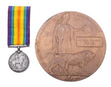 A WWI death plaque commemorating Arthur Herbert Sheard. Together with a war medal and photographs.