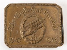 A brass commemorative belt buckle for 'The Eagle Has Landed'.