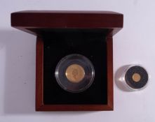 A Canada gold quarter 1oz fine gold maple. With other small gold coin.