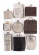 Nine pewter and white metal hip flasks.