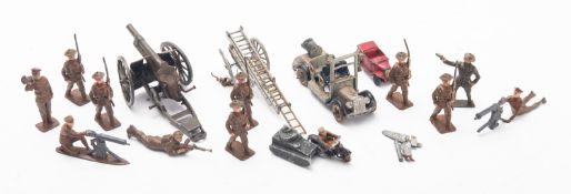 A collection of WWI John Hill diecast model soldiers, in a variety of poses,