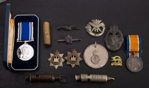 A WWI War Medal to ' 19091 Pte E F Atkinson E York R' , together with a German tank assault badge,