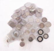 A large collection of mixed silver coins.